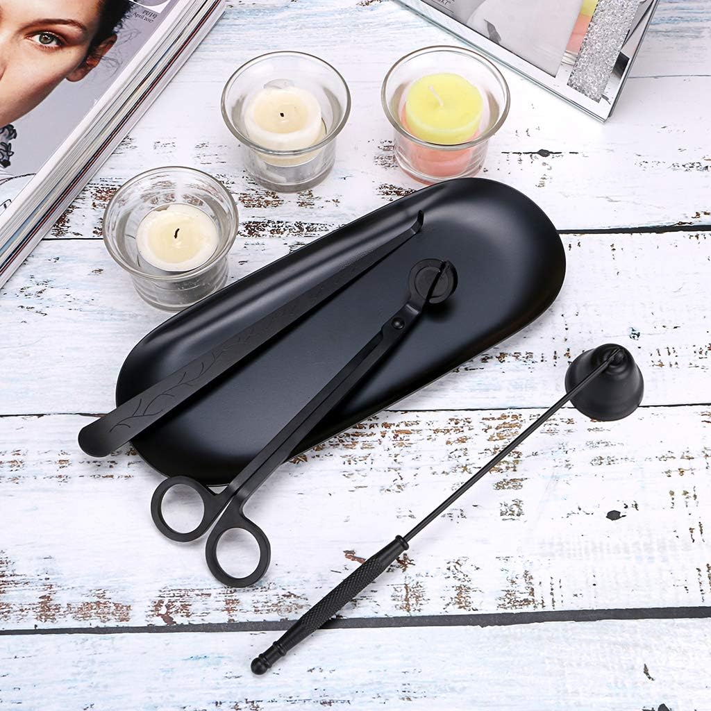 Matte black candle care kit styled with candles on a table