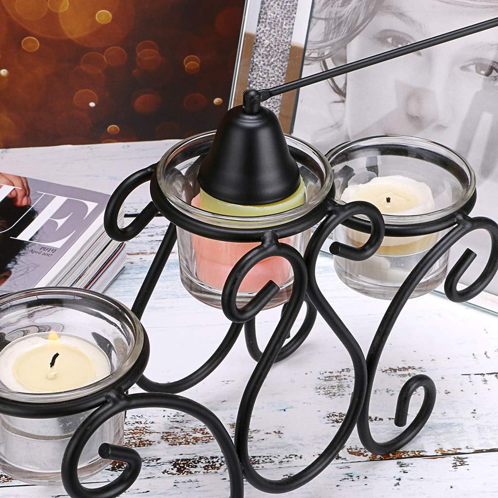 Bell snuffer extinguishing a candle flame